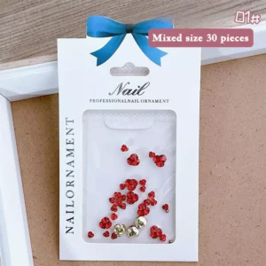 Red rhinestone clusters in branded nail art packaging