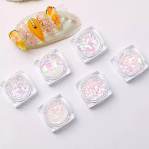 Nail art using round aurora sequins with soft shimmer