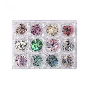 Real shell nail art flakes in earthy and metallic tones, arranged in a 12-color kit