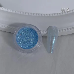 Blue iridescent nail powder with sparkling holographic flakes in clear jar