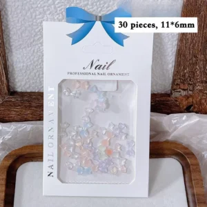 Nail ornament retail package with 30 pastel iridescent bow charms