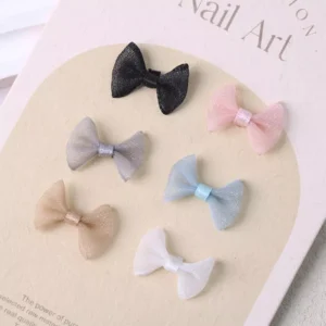 Set of pastel mesh bow nail decorations in multiple colors