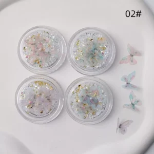 Pastel blue and pink iridescent butterfly nail decorations