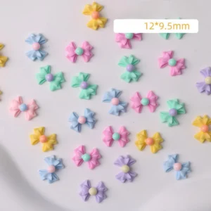 Spread of colorful nail charms with product size 12×9.5mm labeled