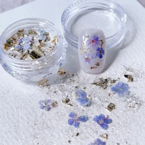 Soft purple pressed flower nail glitter with gold leaf and shimmer