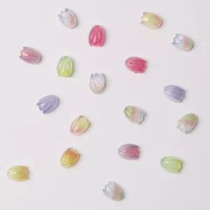 Multicolor tulip-shaped nail charms in gradient pastel finish
