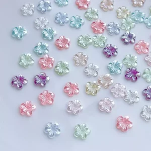 Mix of iridescent 5-petal resin flowers in assorted pastel tones