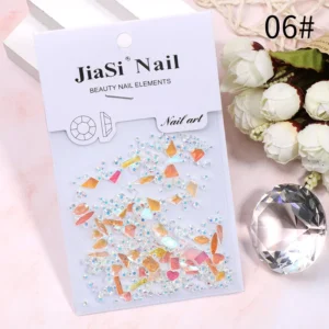 Soft peach and white iridescent rhinestones for nail art