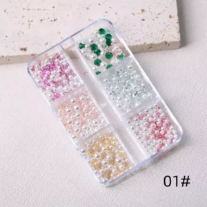 Mixed pearl and crystal nail decorations in pink, green, yellow tones