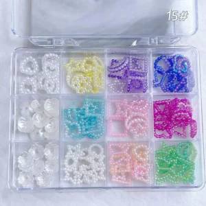Pearl Frame & 3D Border Nail Charms arranged in a grid display case with assorted colorful resin pieces