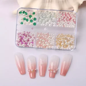 Multi-color pearl and rhinestone nail decorations organized in 12 compartments