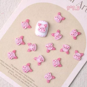 Pink piglet face resin nail charms in semi-gloss finish, size 9×9.5mm