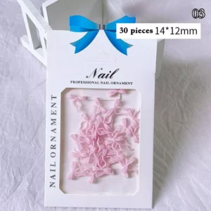 Pink bow ribbon nail charms in professional packaging with 30 pieces