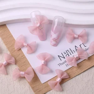Pink pastel tulle bows with feminine nail art