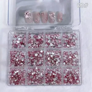Pink flat back rhinestones displayed with nude glitter nail samples