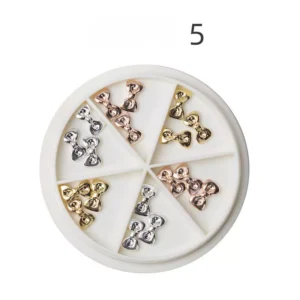 Plump metallic bow nail charms with glossy finish