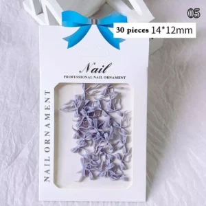 Purple bow ribbon nail charms in professional packaging with 30 pieces