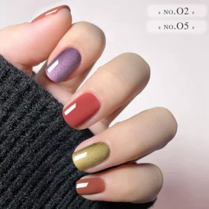 Purple and gold chrome gel polish worn on manicured fingers