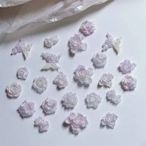 Iridescent purple resin flower charms in mixed rose styles