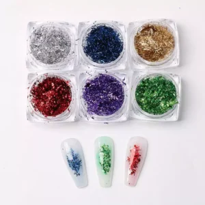 Set of colorful rainbow nail art foils including green, red, purple, blue, gold, and silver with nail swatch examples