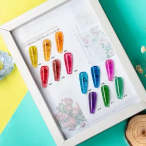 Framed nail color palette featuring flower-infused builder gels