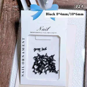 Product packaging of red 3D bow tie nail charms in 8x4mm and 10x6mm
