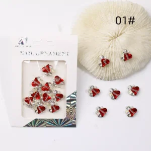 Ruby red heart nail charms with crystal and pearl accents