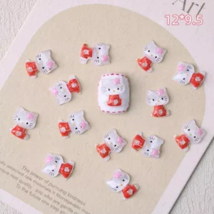 Red-dressed cat nail charms with pink star headbands