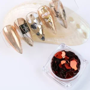 Red metallic heart shaped nail glitter with romantic nude gold nail designs