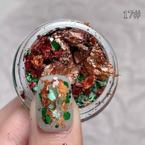 Red and gold holographic nail flakes for festive and glamorous nail designs