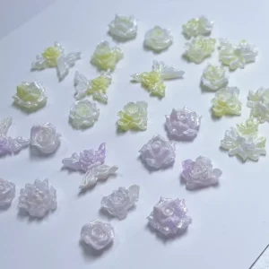 White and lavender shiny 3D floral nail charms in various resin flower shapes
