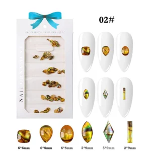 Golden amber resin nail gemstones in oval, square, and elongated shapes