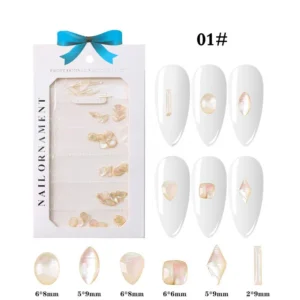 Iridescent cream-toned resin nail charms in assorted shapes with pearl shine