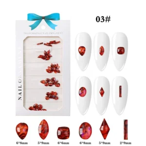 Bright ruby red resin nail charms in heart, diamond, and rectangular cuts