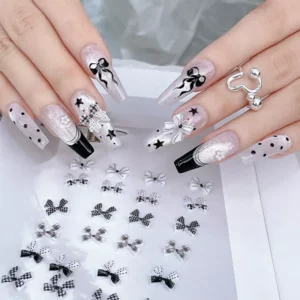 Full nail set using Plaid Bow Nail Charms with star accents and black-white design