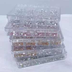 Stacked rhinestone kits for nails in assorted colors and shapes