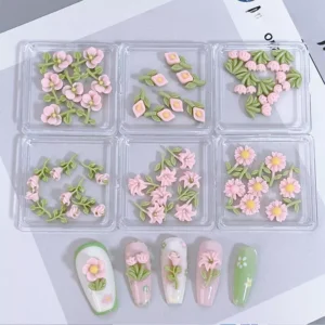 Romantic floral nail embellishments with vines and buds in pink and green palette