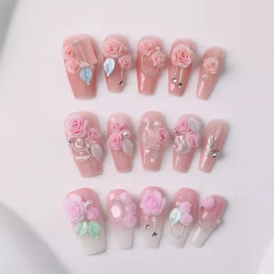 Romantic pink rose nail designs with pearls, silver leaves, and 3D floral texture