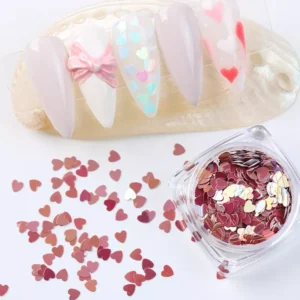 Red Candy Heart Nail Sequins with scattered flakes and finished nails