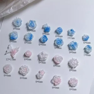 Blue and pink iridescent rose nail charms with size labels
