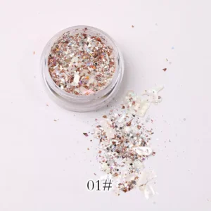 Rose gold glitter flake jar labeled 01# with powder spilled on surface
