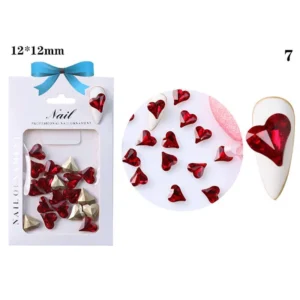 Red crystal heart on almond white nail