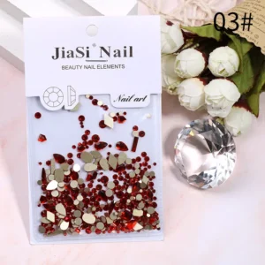 Ruby red nail crystals in teardrop and diamond shapes
