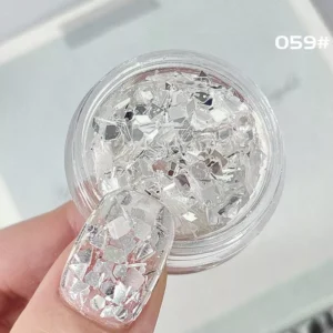 Clear holographic diamond-cut nail glitter in crushed shapes