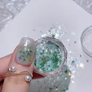 Green dried floral glitter nail decoration with shell flakes
