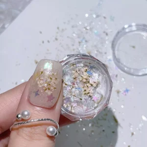 Creamy white dried flower and shell glitter mix on thumb nail