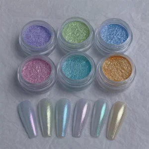 Close-up of pastel Starlight Glitter Powders with applied nail samples