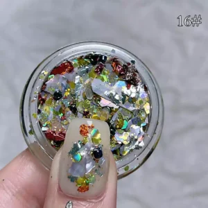 Colorful, shimmering nail flakes in iridescent hues for unique nail designs