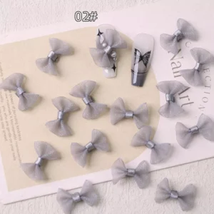 Silver gray tulle nail bows for subtle and classy nail art