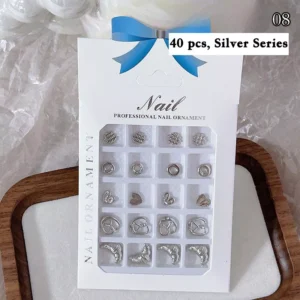 Assorted silver nail charms in 40-piece box